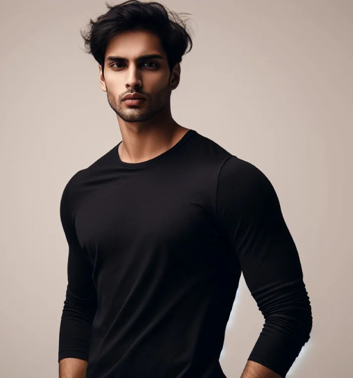 A model wearing a black Long Sleeve T-Shirt from Oakham Clothing Line